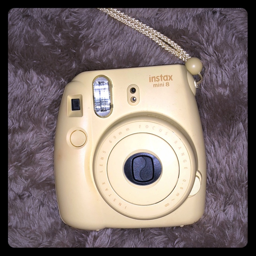 Light yellow Polaroid Camera
